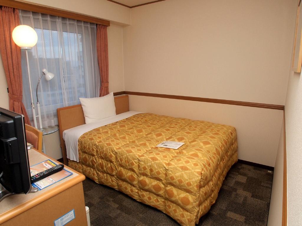 Toyoko Inn Hokkaido Asahikawa Ekimae Ichijo Dori Buitenkant foto